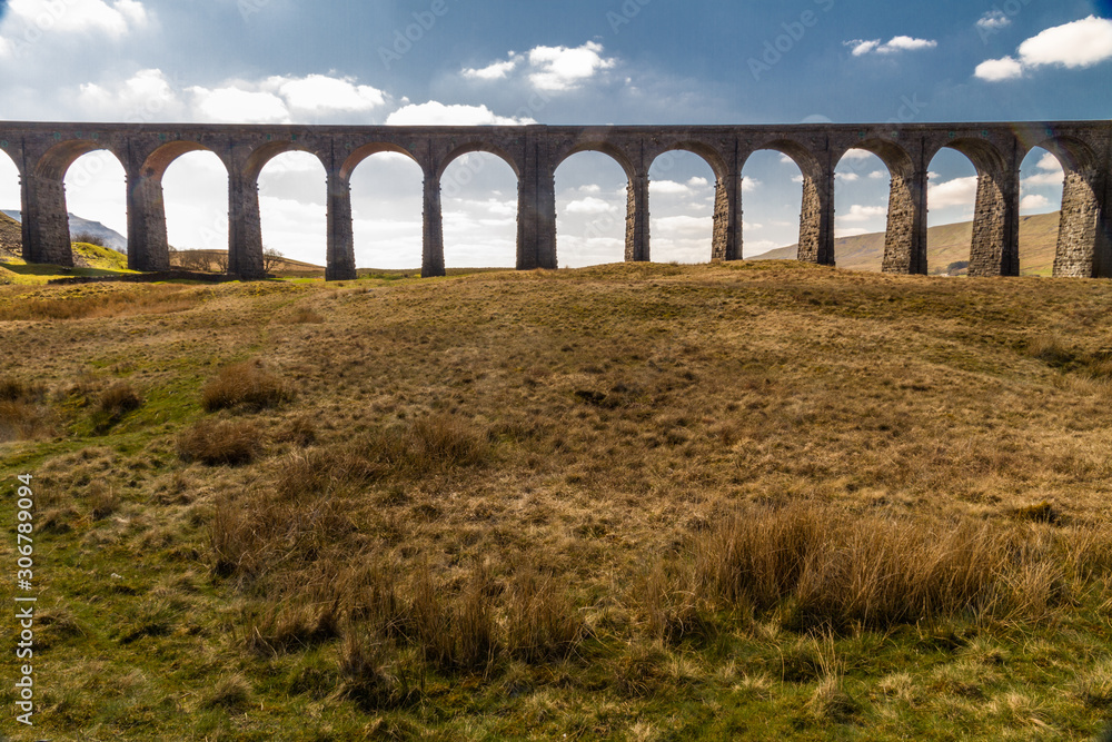 Fototapeta premium Arches of a graceful railway viaduct.