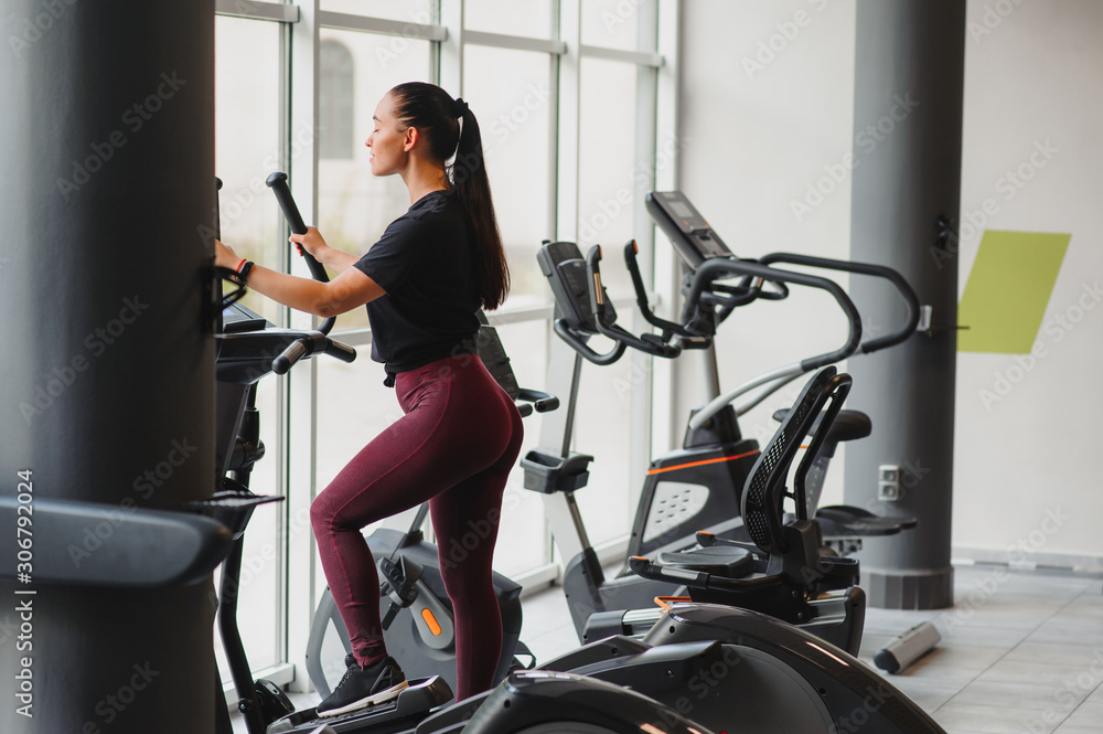 Fototapeta premium Woman was running on the treadmill in the gym