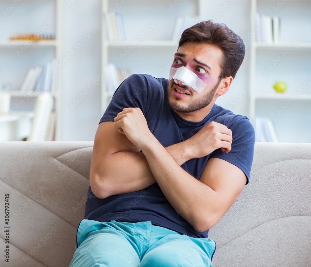 Young man recovering healing at home after plastic surgery nose Young man recovering healing at home after plastic surgery nose