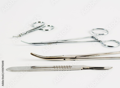 Medical instruments on a white background. Selective focus