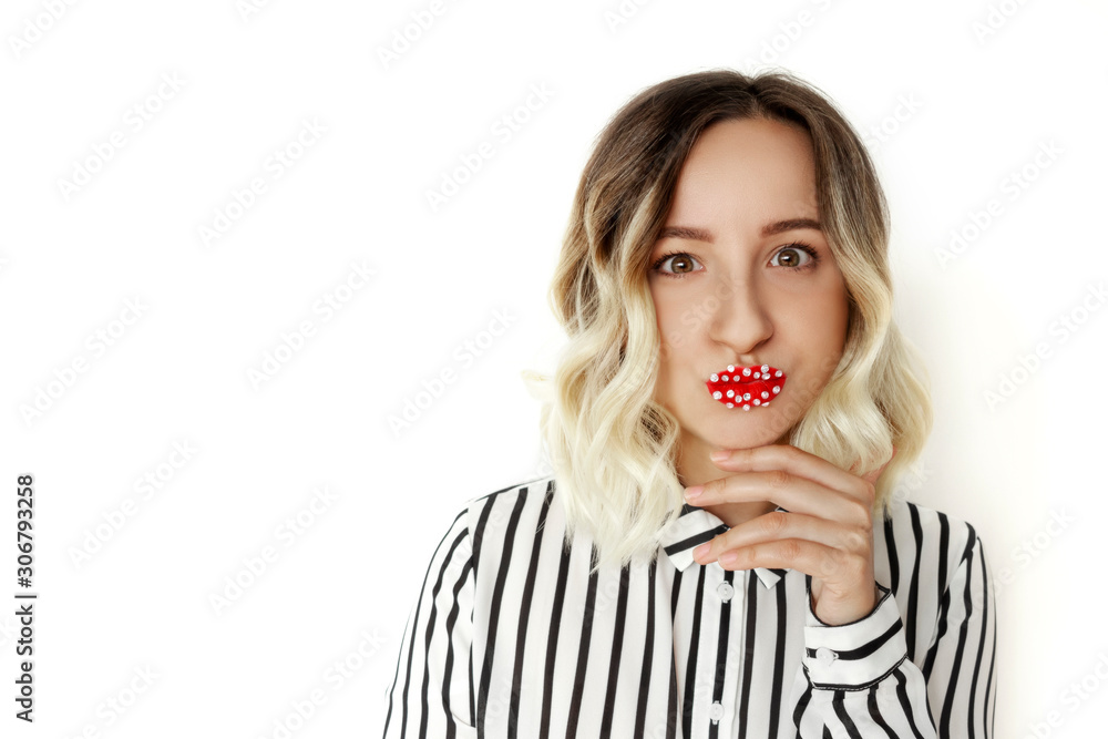 Bright blonde female in blouse with red lipstick, plump lips, rhinestones isolated on white background. Beauty Make up concept. Botox treatment for cosmetologist. Pure perfect skin. Copy space Bright blonde female in blouse with red lipstick, plump lips, rhinestones isolated on white background. Beauty Make up concept. Botox treatment for cosmetologist. Pure perfect skin. Copy space
