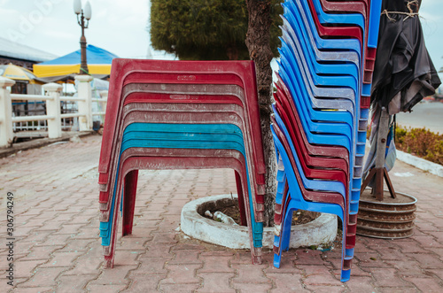 Plastic chairs on the street in summer Asia