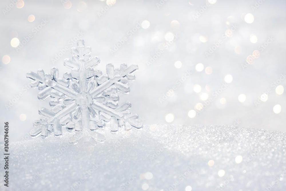 Winter background. Christmas and new year card. Snowflake on snow background Winter background. Christmas and new year card. Snowflake on snow background