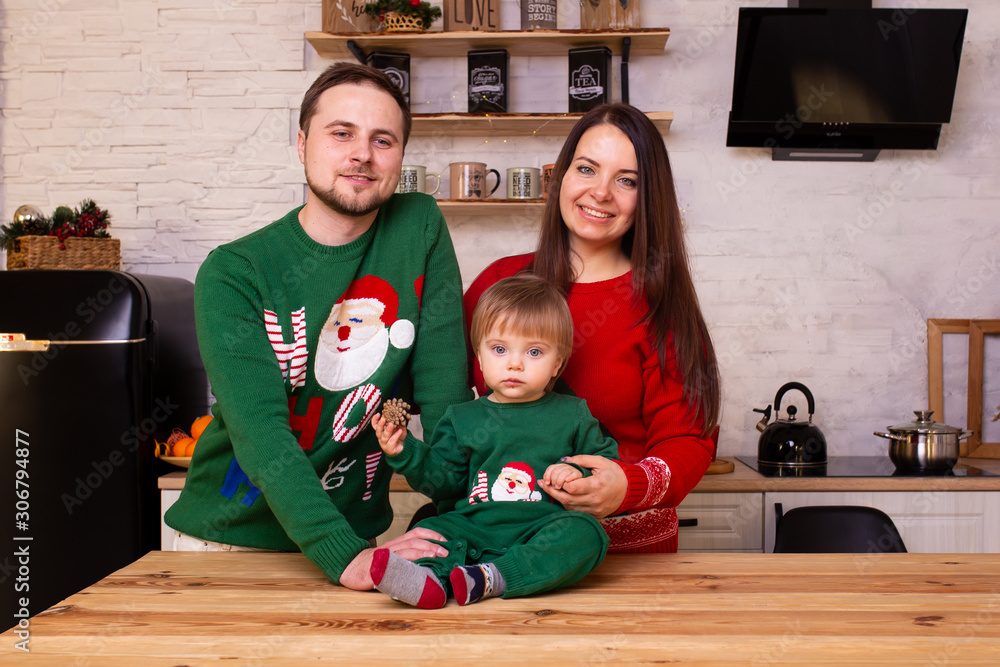 Fototapeta premium Family in the kitchen on Christmas time