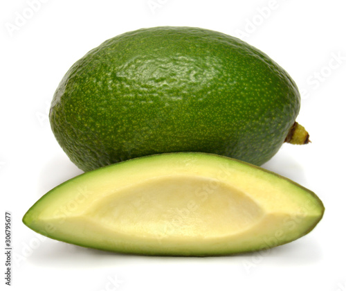 Avocado whole and piece isolated on a white background