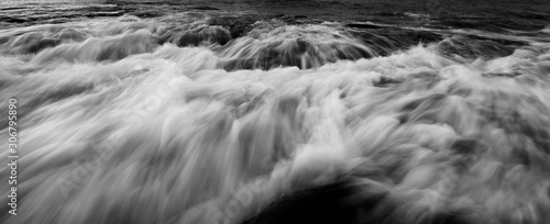 Dramatic long exposure waves in black and white taken in Kudat, Sabah, Malaysia