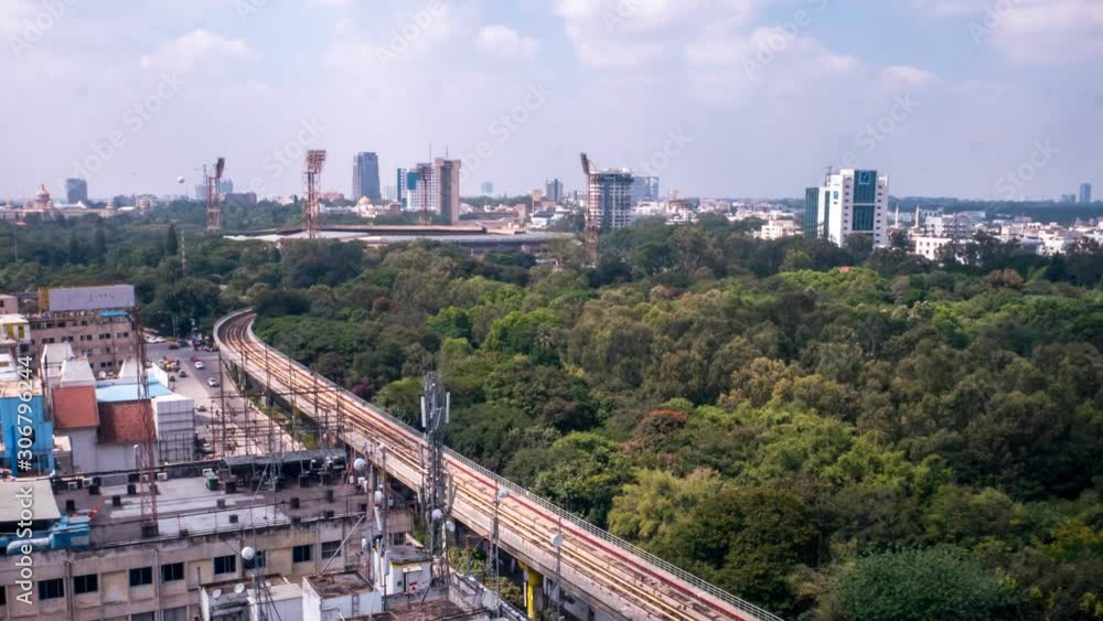 Time Lapse of Urban Train Passing By towards Downtown Buildings Time Lapse of Urban Train Passing By towards Downtown Buildings