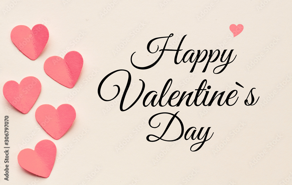 Happy Valentines day text on a sheet of paper. A holiday of love and lovers - concept. High resolution image.