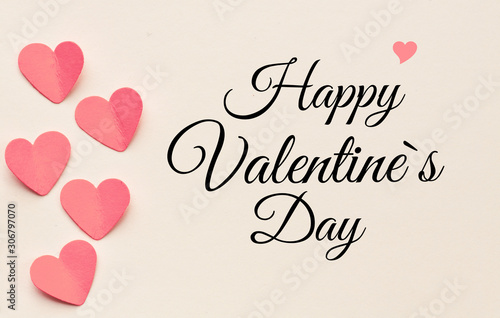 Happy Valentines day text on a sheet of paper. A holiday of love and lovers - concept. High resolution image.