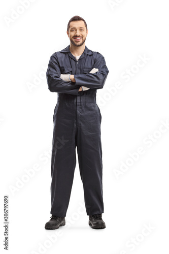 Obraz na płótnie Mechanic in a dark blue overalls