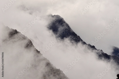 andes mountains showing through clouds
