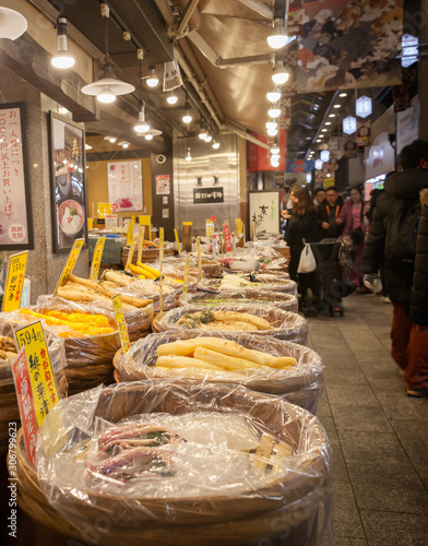Shop selling pickled vegetables in Nishiki Ichiba market in Kyoto, Japan