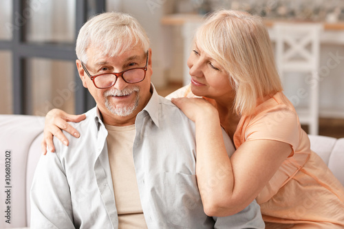 Happy mature couple resting...