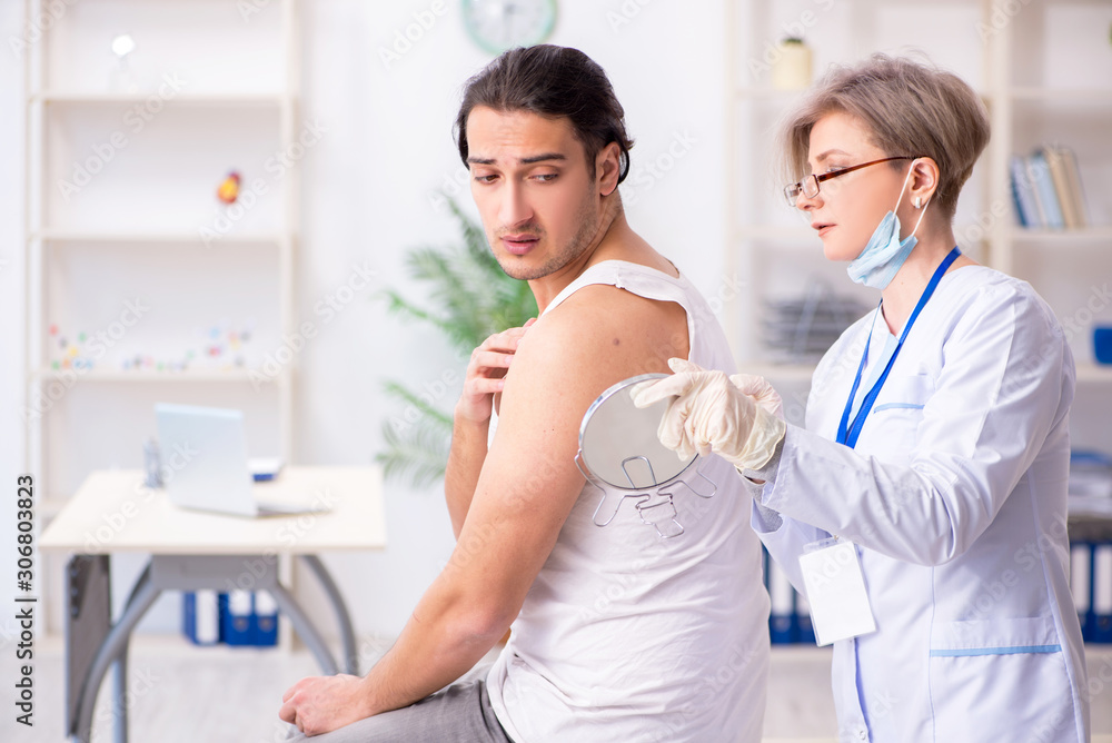 Fototapeta premium Young patient visiting doctor in hospital