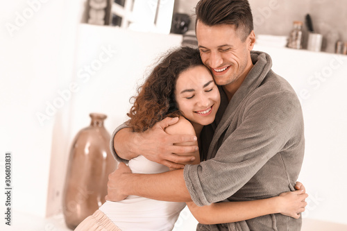 Happy young couple in bathroom at home © Pixel-Shot