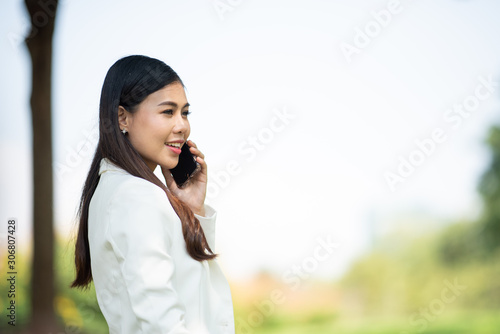businesswomen using smartph...