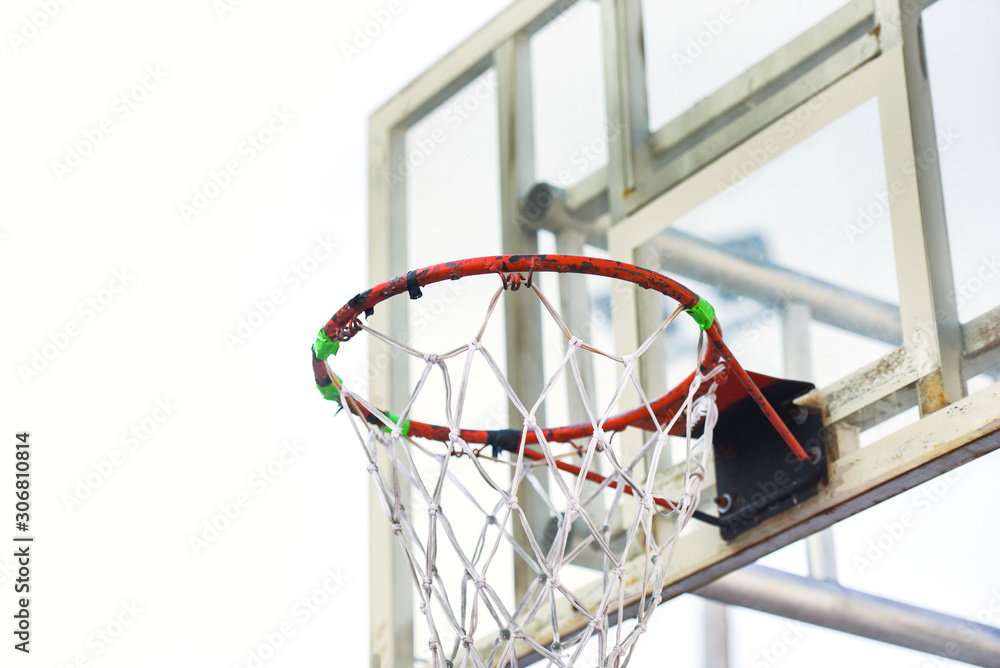 Old basketball hoop on white background in the sport outdoor playground public arena street sports Old basketball hoop on white background in the sport outdoor playground public arena street sports
