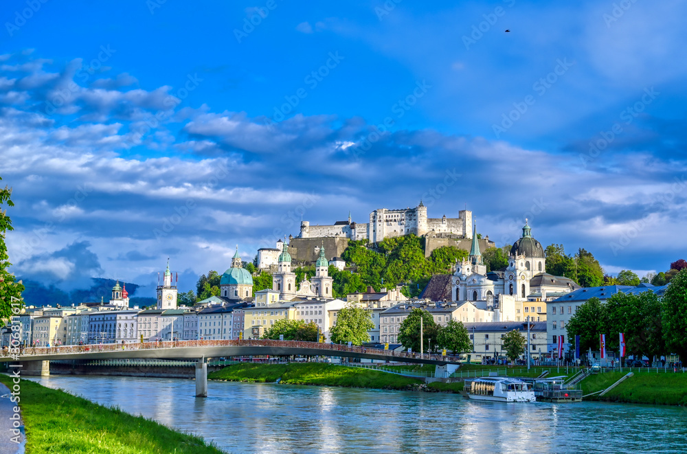 Fototapeta premium A view of the Austrian city of Salzburg along the Salzach River.