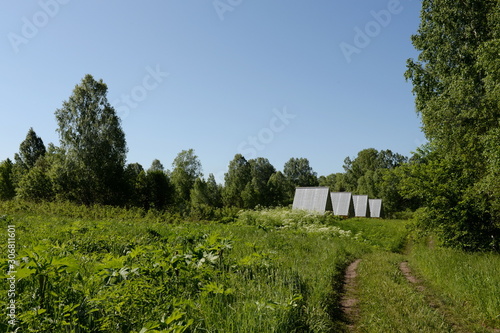 Summer houses for tourists on the shore of lake Krasilovo in the Altai territory