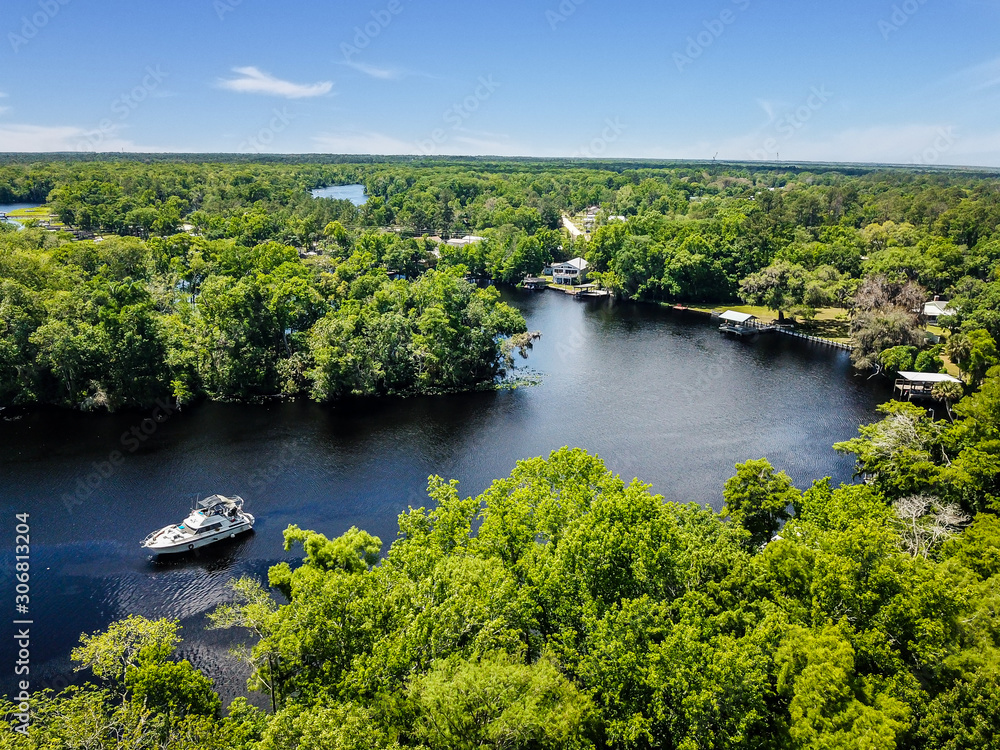 Fototapeta premium Aerial view of a boat in the river