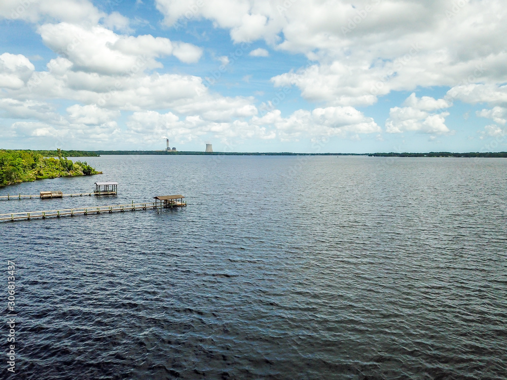 Aerial view of a large river with docks