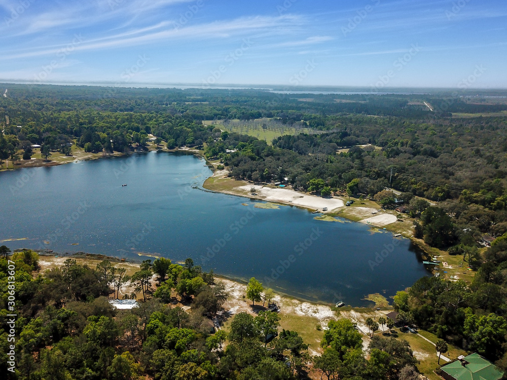 View of a blue lake taken by a drone