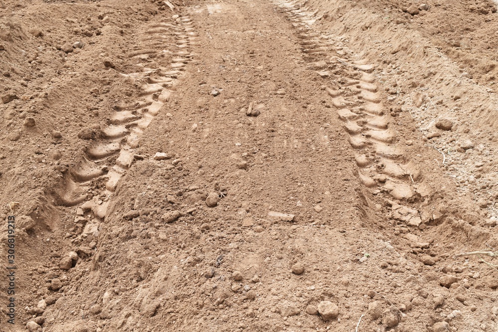lots tire track on dirty soil ground for abstract background lots tire track on dirty soil ground for abstract background