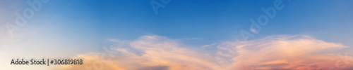 Panorama of Dramatic vibrant color with beautiful cloud of sunrise and sunset. Panoramic image. © tanarch