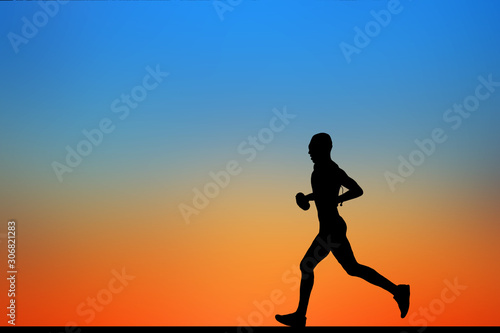 silhouette Running athlete on sunset