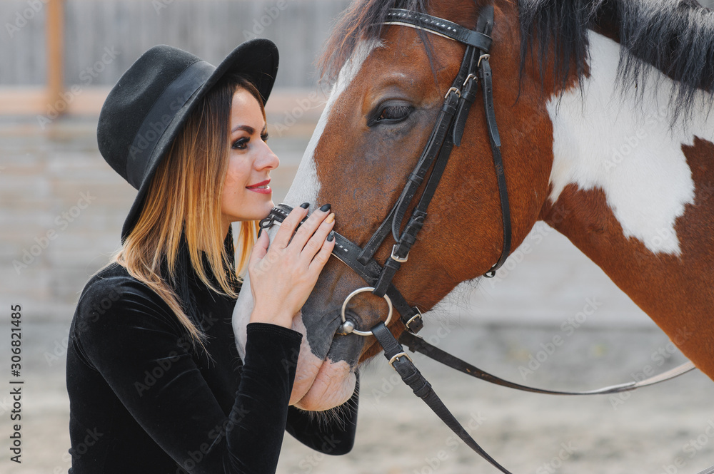 young-woman-physiotherapist-taking-care-a-brown-horse-woman-making-a