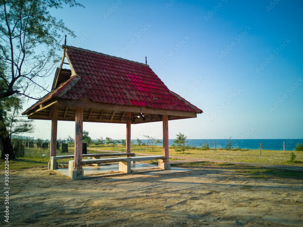traditional chinese pavilion on the beach