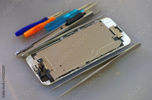 Repairing mobile phones and tablets by skilled technicians.Experienced testers and check mobile phones. Before and After RepairTools and equipment for repairing and unpacking mobile phones.