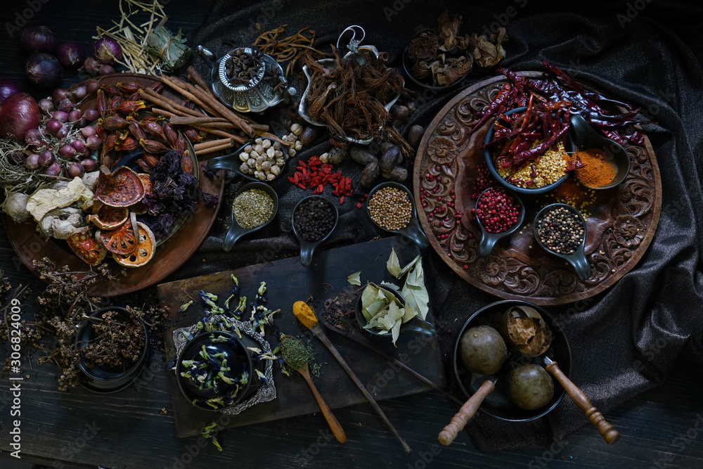 Fototapeta premium A variety spices and herbs in wooden bowls, Of Asians For cooking.