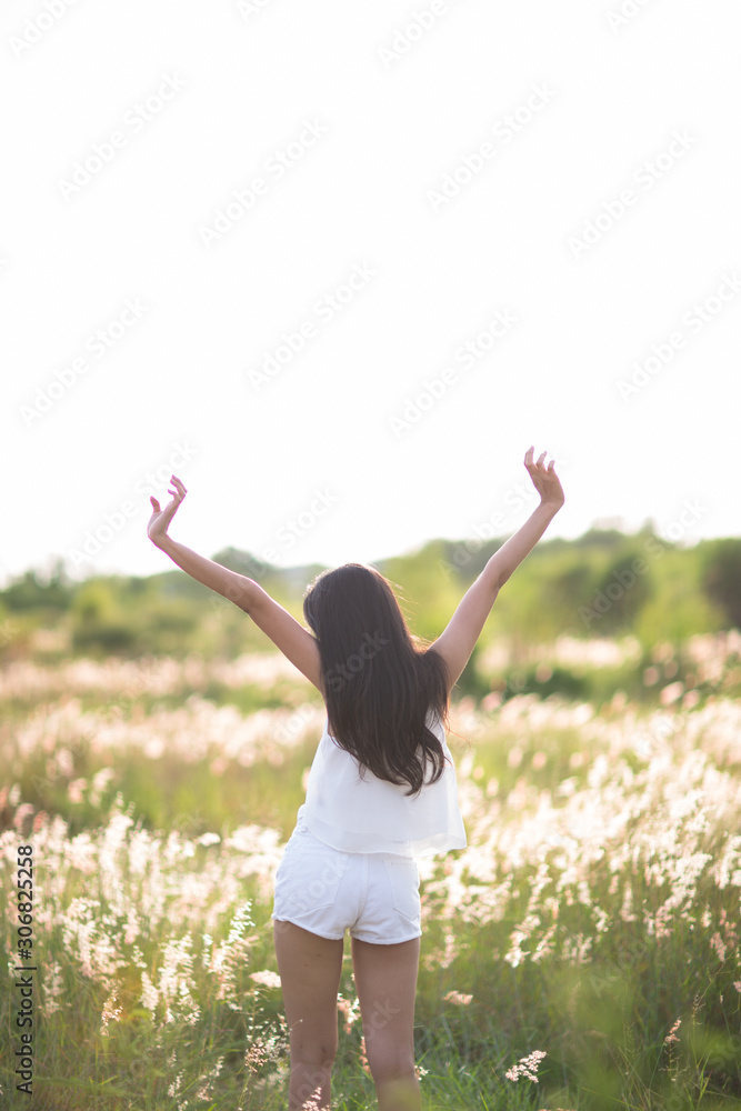Free Happy Woman Enjoying Nature. Beauty Girl Outdoor. Freedom concept. Beauty Healthy Girl over Sky and Sun. Enjoyment Free Happy Woman Enjoying Nature. Beauty Girl Outdoor. Freedom concept. Beauty Healthy Girl over Sky and Sun. Enjoyment