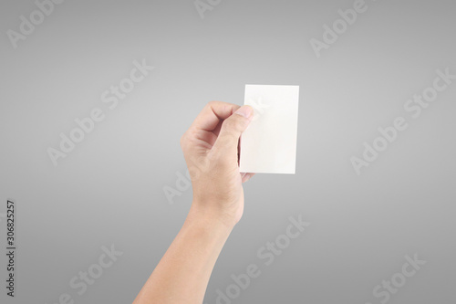 Hand holding virtual card with your. Isolated