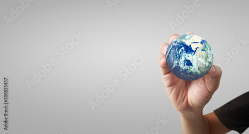 Globe  earth in human hand  . Earth image provided by Nasa