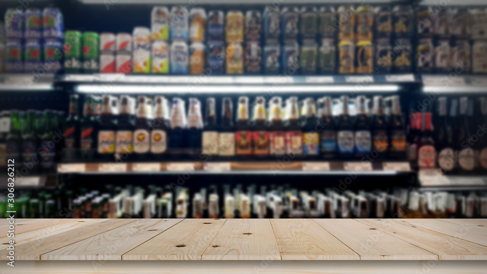 Abstract blur wine bottles on liquor alcohol shelves in supermarket background