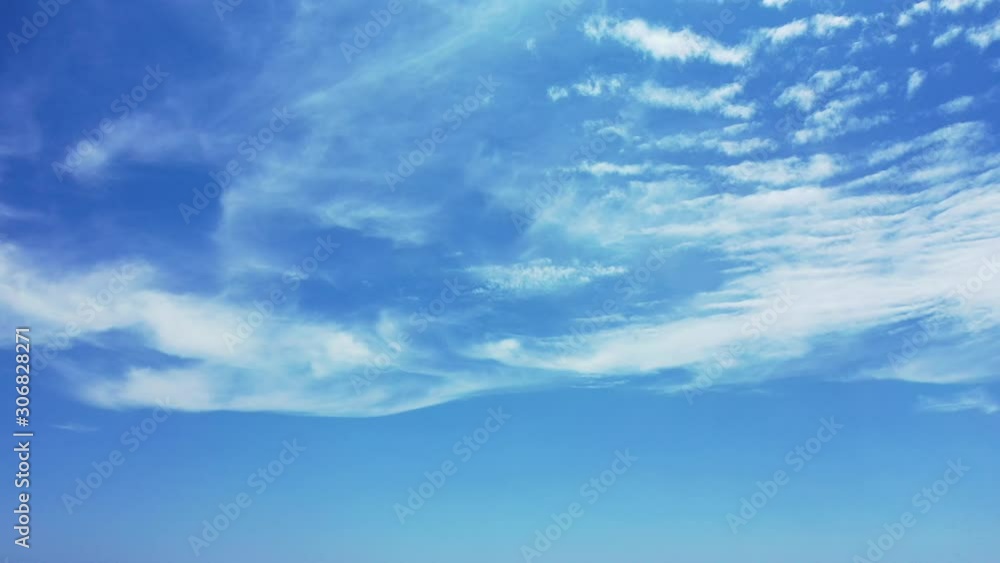 Peaceful beautiful structure of frozen clouds into blue heaven over Pacific ocean, sky texture design, copy space Peaceful beautiful structure of frozen clouds into blue heaven over Pacific ocean, sky texture design, copy space