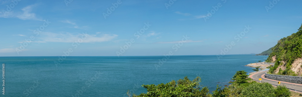 Panorama image of Beautiful Seascape Viewpoint of the roadway alongside with blue sea that is landmark at Kung Wiman Bay in Chanthaburi Province, Thailand. Panorama image of Beautiful Seascape Viewpoint of the roadway alongside with blue sea that is landmark at Kung Wiman Bay in Chanthaburi Province, Thailand.