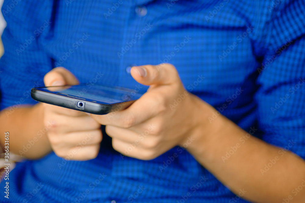Using Smartphone. Close up of a human using mobile smart phone. Using Smartphone. Close up of a human using mobile smart phone.