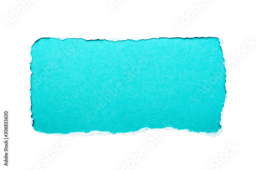 A hole in white paper with torn edges isolated on a white background with a light blue color paper background inside. Good paper texture