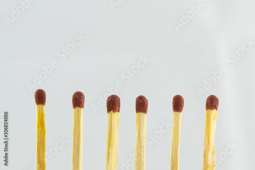 Pile of Wooden unused matches isolated over the white background