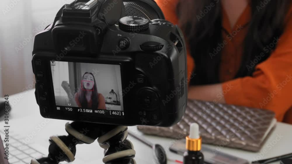 Young beautiful girl blogger actively tells her thoughts to the camera. Young beautiful girl blogger actively tells her thoughts to the camera.