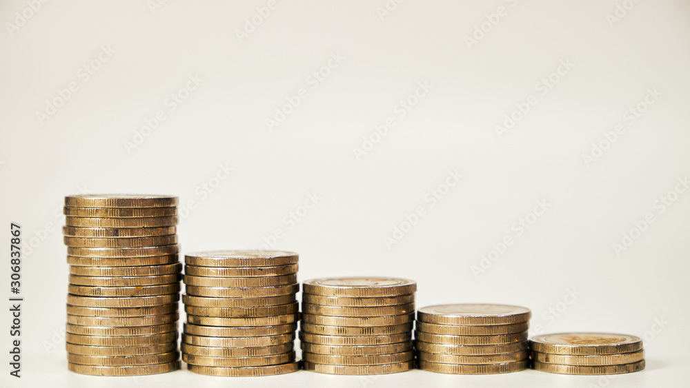 Business concept of saving money on investment on white background, Stack coins and text box. Thai letter meaning is King of Thailand Business concept of saving money on investment on white background, Stack coins and text box. Thai letter meaning is King of Thailand