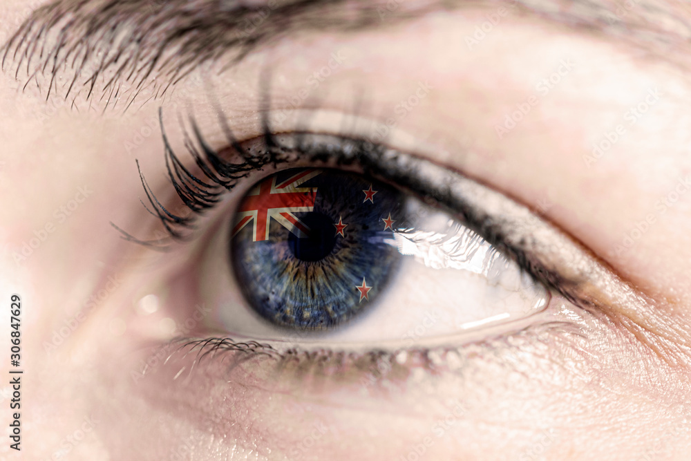 Flag of new zealand, reflects in woman green eye - close-up view - election, sport, hope, young, generation Flag of new zealand, reflects in woman green eye - close-up view - election, sport, hope, young, generation
