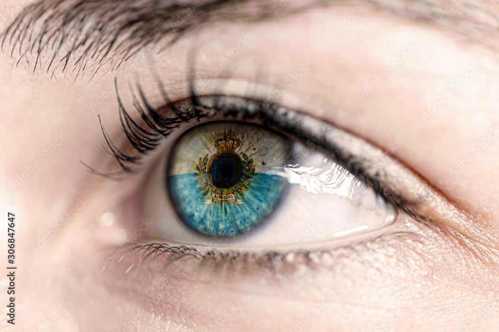 Flag of san marino reflects in woman green eye - close-up view - election, sport, hope, young, generation Flag of san marino reflects in woman green eye - close-up view - election, sport, hope, young, generation