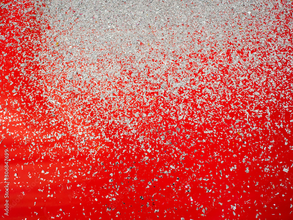 Light silver glitter confetti party on luxury red carpet floor textured background on Happy New Year and Merry Christmas fun festive event Light silver glitter confetti party on luxury red carpet floor textured background on Happy New Year and Merry Christmas fun festive event