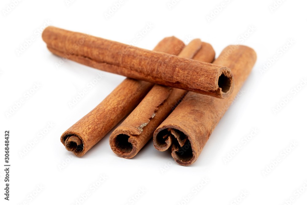 Top view cinnamon sticks isolated on white background. Top view cinnamon sticks isolated on white background.