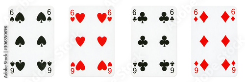 Four Playing Cards Isolated on White Background, Showing Six from Each Suit - Hearts, Clubs, Spades and Diamonds - High resolution photo