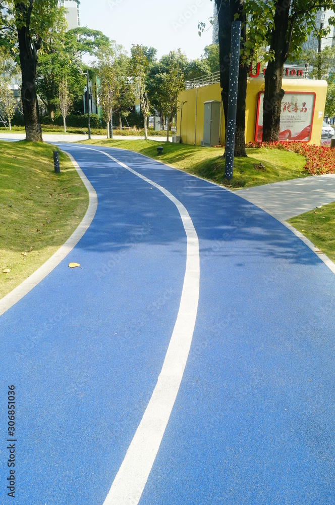 The sports track is in the park The sports track is in the park